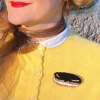 Eclair Au Chocolat Brooch